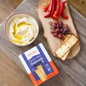 alt="Absolutely Gluten Free Grain Free Flatbreads served with grapes, cheese and crisp flatbreads."